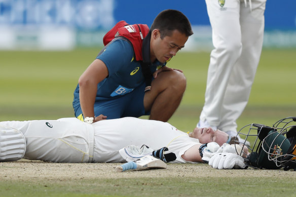 Steve Smith receives medical assistance after being hit in the neck by Jofra Archer at Lord’s in 2019. He left the field but returned to bat once Peter Siddle was dismissed.