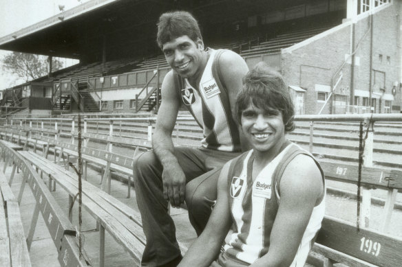 Jim (left) and Phil Krakouer while playing for North Melbourne in the 1980s.