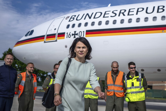 Minister for Foreign Affairs Annalena Baerbock in front of a German government plane.