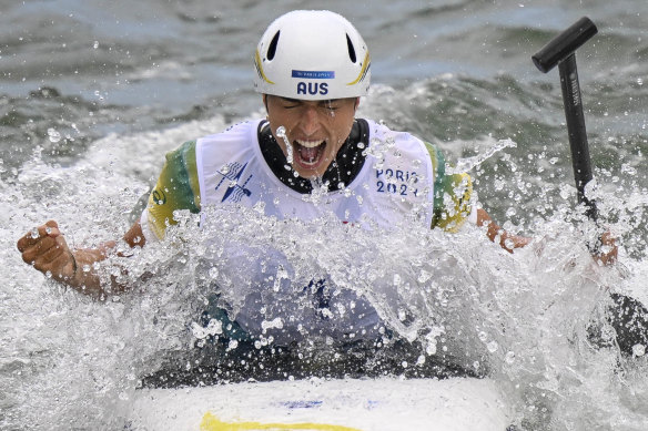 Jessica Fox celebrates her gold medal performance.