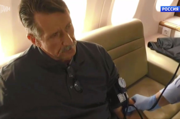 Russian citizen Viktor Bout sits in a Russian plane after the swap.