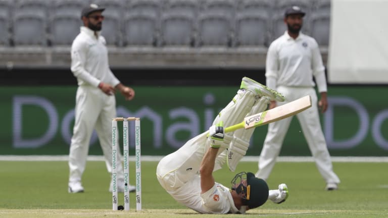 Evasive: Tim Paine avoids a short ball while batting.