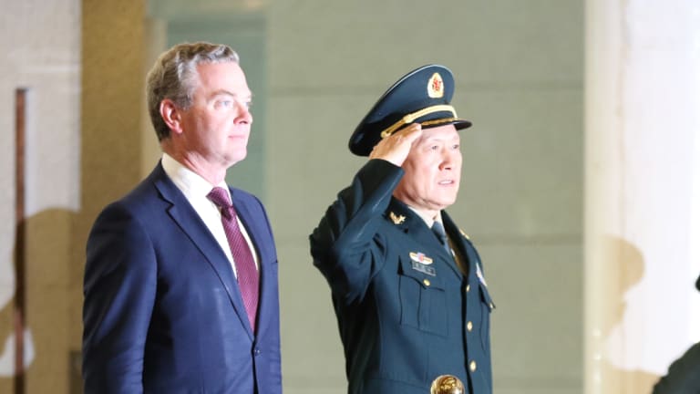 Australian Minister of Defence Christopher Pyne (right) and Chinese Minister of National Defence Wei Fenghe (centre) reviewing the PLA guards of honour in Beijing.