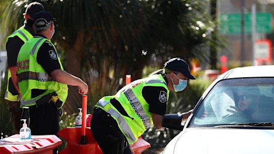 Police stop vehicles on the Queensland border at Coolangatta.