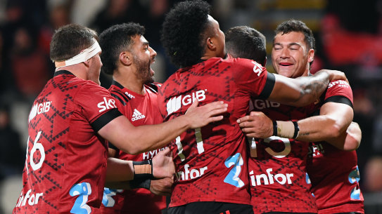 David Havili, right, and the Crusaders celebrate after Will Jordan scores against the Chiefs in round three of Super Rugby Aotearoa 2021.