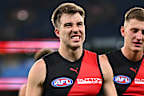 Zach Merrett of the Bombers looks dejected after losing to the Hawks.