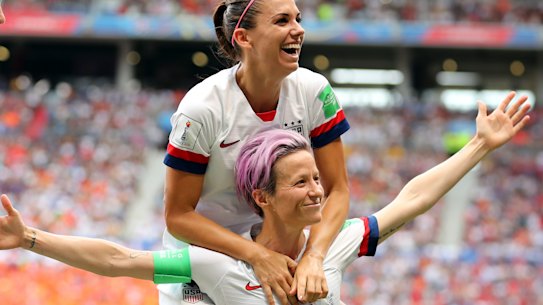 Megan Rapinoe celebrates with her US teammates after scoring the opening goal of the World Cup final against the Netherlands in Lyon.