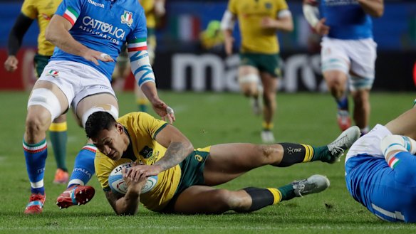 Team player: Ashley-Cooper provided good support for Israel Folau.
