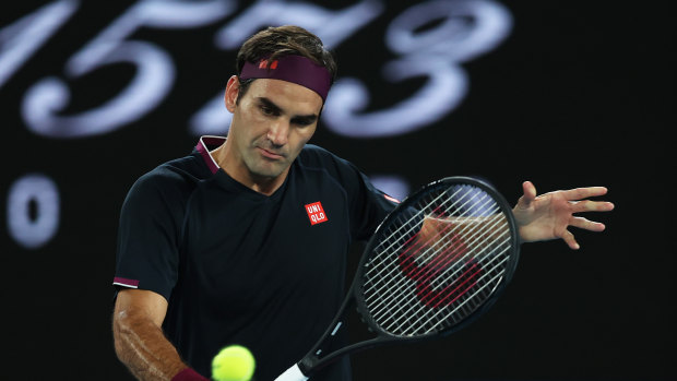 Federer plays a backhand during an easy win against Filip Krajinovic.