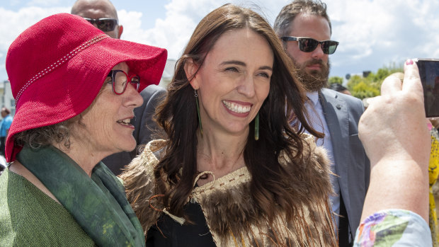 New Zealand Prime Minister Jacinda Ardern (center) poses for a photo as she arrives in Ratana on Tuesday.