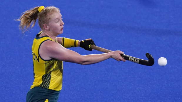 Australia’s Amy Rose Lawton knocks the ball out of the air against New Zealand .