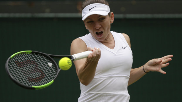 Romania's Simona Halep returns the ball to China's Shuai Zhang en route to the Wimbledon semi-finals.