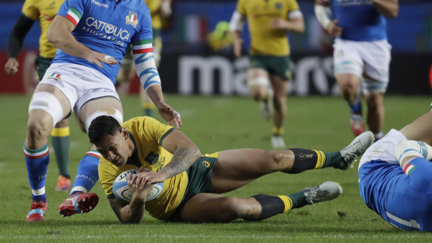 Team player: Ashley-Cooper provided good support for Israel Folau.