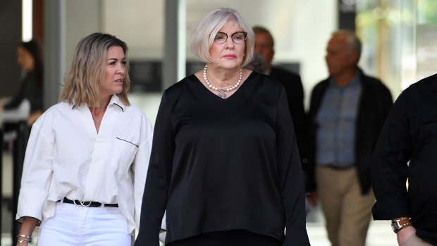Glenda Wagner (centre), sister in law of murder victim Gerhard Wagner, leaves the Supreme Court in Brisbane on Thursday.