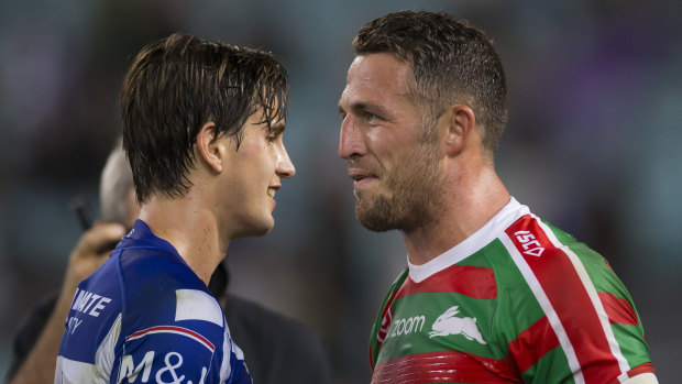Friendly rivals: Lachlan Lewis and Sam Burgess share a laugh after their Good Friday clash.