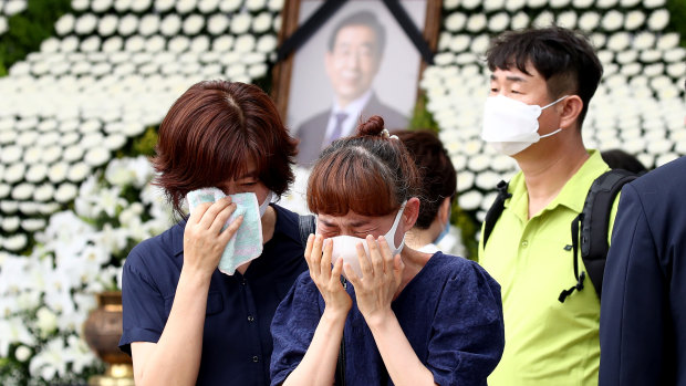 People mourn mayor Park Won-soon outside City Hall in Seoul, South Korea.