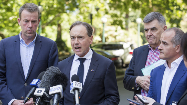 Federal Minister for Education Dan Tehan (left) Federal Minister for Health, Greg Hunt, and Victorian Education Minister James Merlino, on Saturday announced a travel ban exemption for some students.
