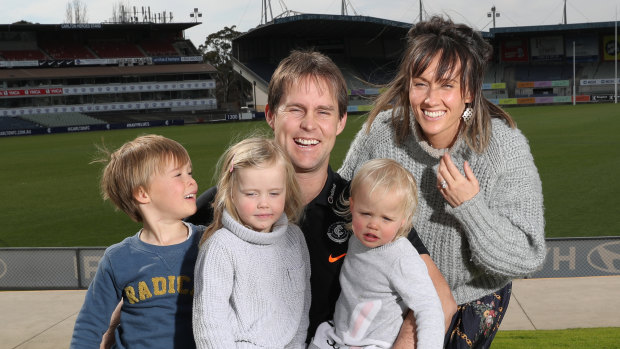 Teague poses with his family at Ikon Park after the announcement.