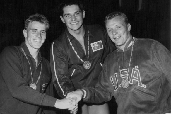 John Konrads (middle) after winning the 1960 Olympic gold medal for the 1500m freestyle, with fellow Australian Murray Rose (left) and American George T. Breen (right).
