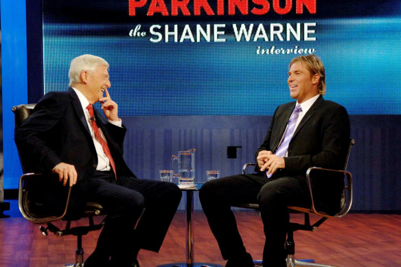 Cricketer Shane Warne, right, is seen during his interview with English television personality Michael Parkinson in Sydney in 2007.
