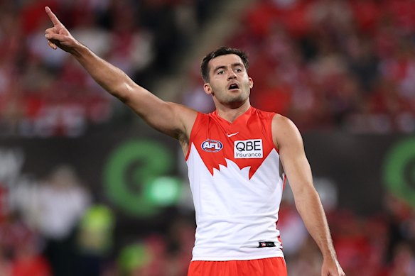 Logan McDonald of the Swans celebrates kicking a goal.