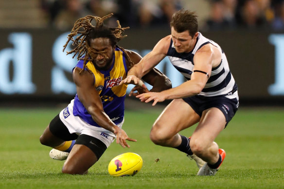 Nic Naitanui and Patrick Dangerfield vie for the ball during Friday night's semi-final.