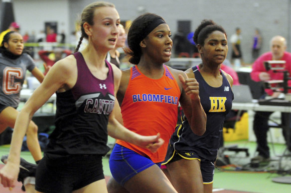 Transgender high school sprinter Terry Miller, centre, races in her local track and field championships last year. Her wins prompted a lawsuit brought on behalf of four competitors. 