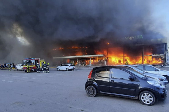 A shopping centre in the Ukrainian town of Kremenchuk after it was hit by a Russian missile.