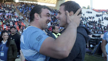 All smiles: Argentina's Agustin Creevy (left) embraces assistant coach Gonzalo Quesada after beating South Africa in 2018. 