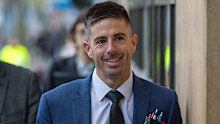 Former AFL umpire Michael Pell arriving at Melbourne Magistrates’ Court for his committal hearing Wednesday morning.