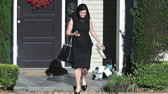 Dominique Grubisa leaving her home in Sydney's northern suburbs.