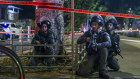 Israeli police take position after a shooting in Jaffa, a mixed Arab-Jewish area of Tel Aviv, Israel.