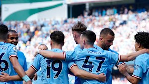 Manchester City’s Julian Alvarez, centre, celebrates after scoring his side’s opening goal during the English Premier League soccer match against Chelsea.