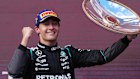 Mercedes driver George Russell of Britain celebrates after winning the Australian Formula One