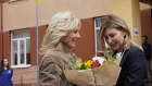 US first lady Jill Biden (left) greets Olena Zelenska, wife of Ukrainian President Volodymyr Zelensky, outside a public school that has taken in displaced students in Uzhhorod.