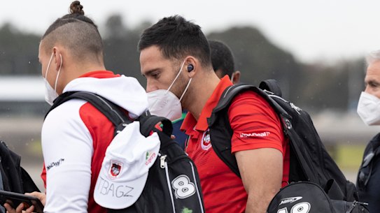 Corey Norman joins Dragons players on their flight to Queensland on Wednesday.