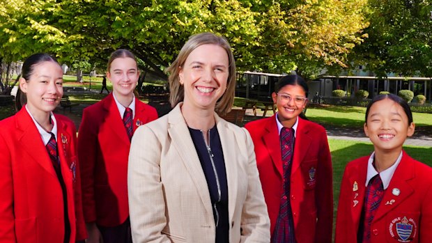 Mentone Girls’ Grammar year 7 students Chloe Cooper, Layla Stanef, Alisha Malla and Claire Guan with principal Lauren Perfect.