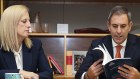 Katy Gallagher and Jim Chalmers read through their budget.