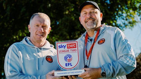 Salford City chief football advisor Paul Scholes and coach Peter Cklamovski.