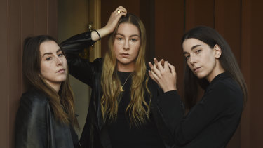 Alana Haim (left) with her sisters Este (middle) and Danielle. Paul Thomas Anderson has directed some of their music videos. 
