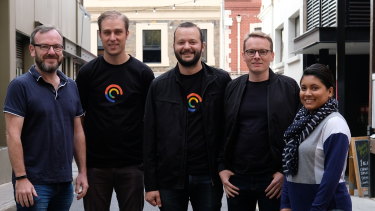 Pocket Casts founder Russell Ivanovic, centre, and his crew.
