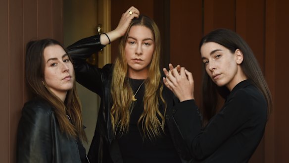 Alana Haim (left) with her sisters Este (middle) and Danielle. Paul Thomas Anderson has directed some of their music videos. 
