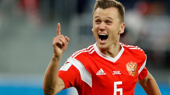 Pure joy: Russia's Denis Cheryshev celebrates after scoring his team second goal. 