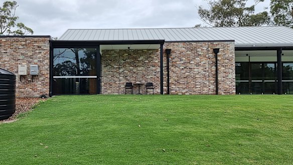 Timber-framed bi-fold glass doors can be pulled right back to allow for the indoors and outdoors to blur.
