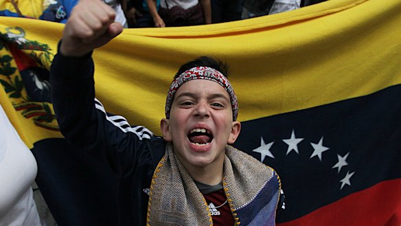 Venezuelans protest outside the Venezuelan embassy in Mexico City.