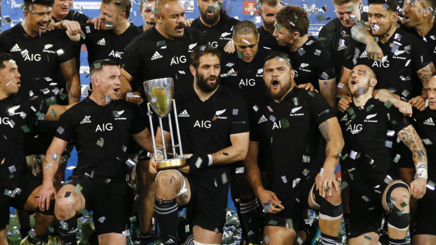 Too good: New Zealand celebrate after winning the Rugby Championship following their victory in Argentina.