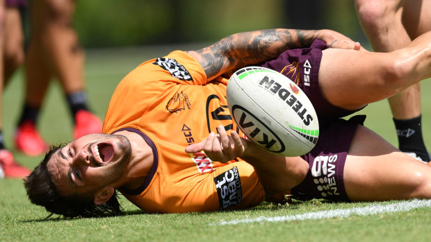 Jack Bird reacts after being injured during Broncos training at Clive Berghofer Field in Brisbane on Wednesday.