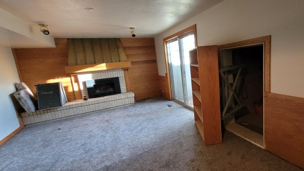 A homeowner got more than they bargained for when they tried to move a book case in their new property.