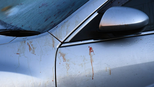 Blood on a car at the scene of the brawl.