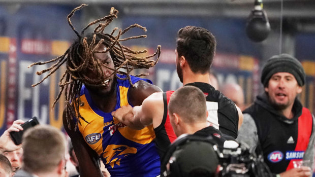 The melee started after Zach Merrett pulled one of Nic Naitanui's dreadlocks, with the big Eagle then shoving the Bomber.